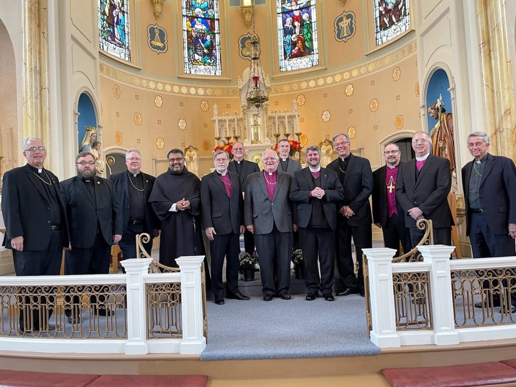 Participants (L-R): Bishop Paul Sobiechowski, Father Soltt Lill, Prime Bishop Anthony Mikovsky, Canon Christian Tutor, Bishop Brian Marsh, Father Senior Robert Nemkovich Jr., Bishop Hendy Webb, Canon Jonathan Foggin, Bishop Chandler Jones, Bishop John Mack, Bishop William Bower, Archbishop Mark Haverland, and Bishop Paul Hewett.-c