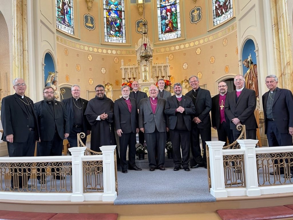 Participants (L-R): Bishop Paul Sobiechowski, Father Soltt Lill, Prime Bishop Anthony Mikovsky, Canon Christian Tutor, Bishop Brian Marsh, Father Senior Robert Nemkovich Jr., Bishop Hendy Webb, Canon Jonathan Foggin, Bishop Chandler Jones, Bishop John Mack, Bishop William Bower, Archbishop Mark Haverland, and Bishop Paul Hewett. 